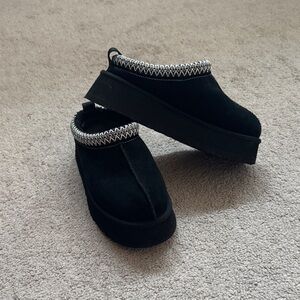UGG Taz. Black Platform Slip-on Slipper or Shoe with White Trim